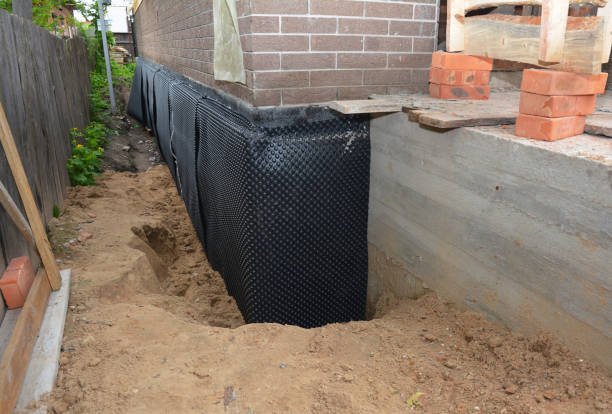 Happy homeowners after waterproofing job in Braddock Heights